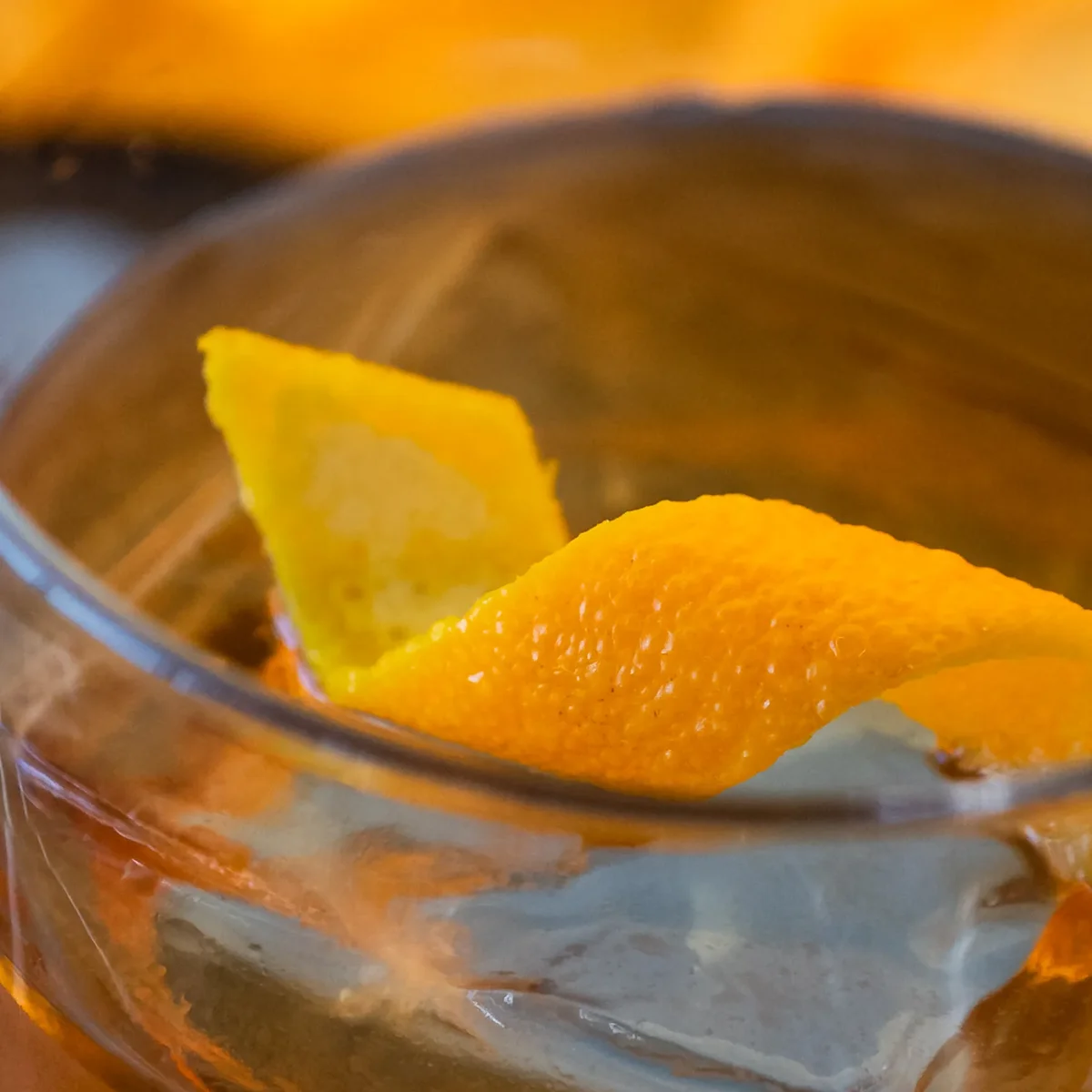 An old fashioned with an orange peel
