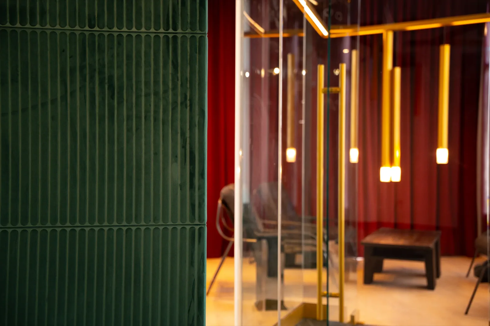 The brass arch and green panelling at Gallantier