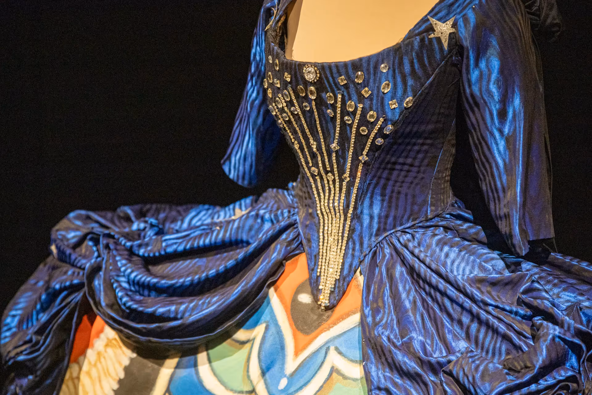 Elaborate blue costume with gold embellishments from Festival di Spoleto