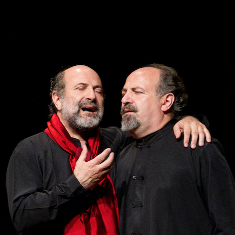 Portrait of two identical men embracing for Festival dei Due Mondi