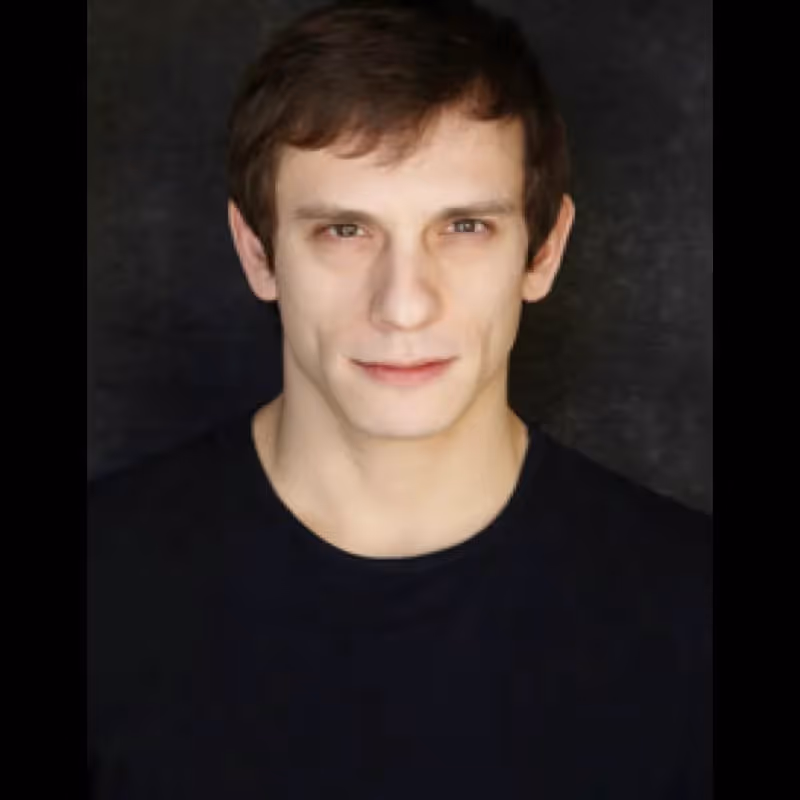 Portrait for Festival dei Due Mondi, young actor against dark background