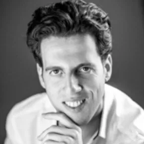 Portrait for Festival dei Due Mondi, smiling man in white shirt