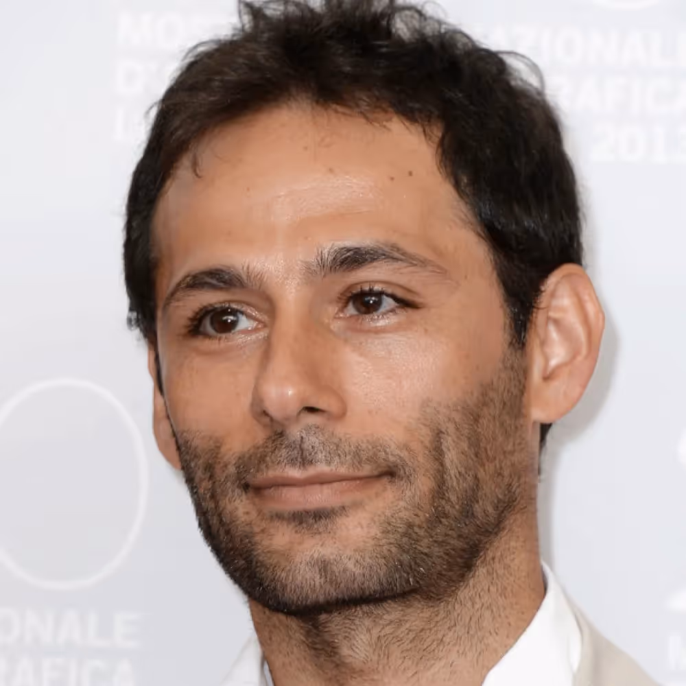 Portrait for Festival dei Due Mondi of serious man with stubble