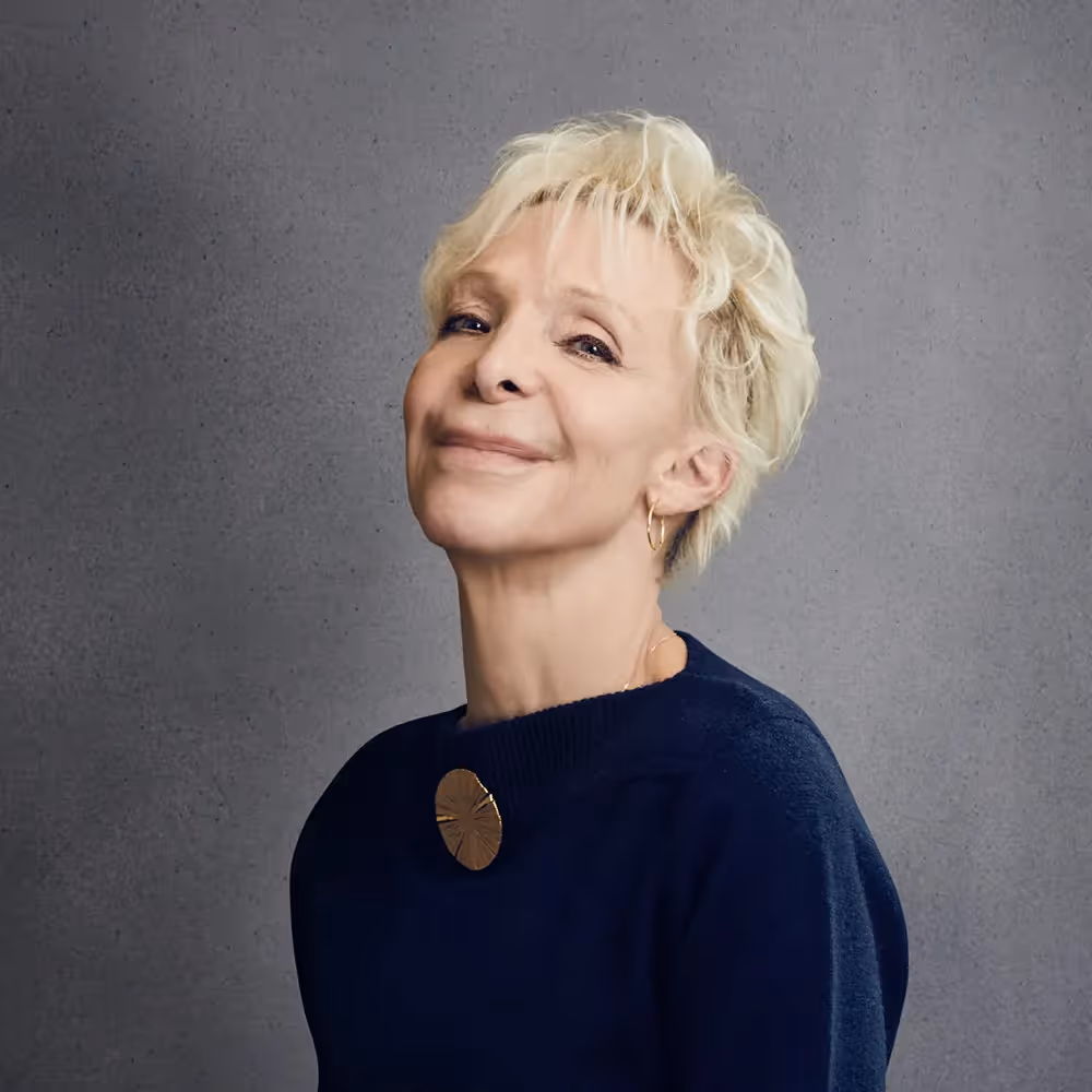 Portrait for Festival dei Due Mondi, smiling woman in blue sweater
