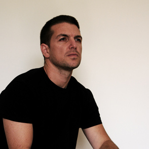 Person in black shirt at Festival di Spoleto arts event looking sideways