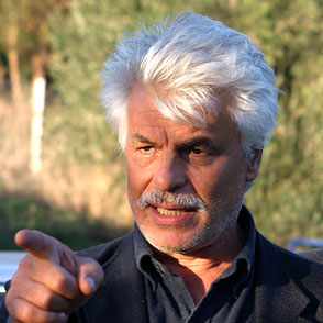 Festival di Spoleto artistic director gestures passionately outdoors