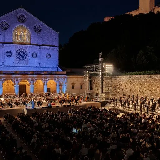 Festival di Spoleto concert at historic cathedral square with orchestra and audience