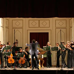 Orchestra performs at Festival di Spoleto on elegant classical stage
