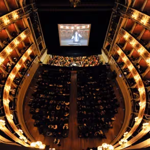 Festival di Spoleto opera performance in historic ornate theater with golden balconies