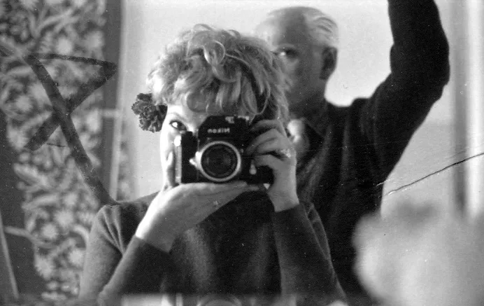 Festival di Spoleto photographer capturing moment with vintage black and white camera