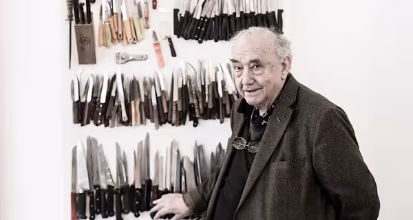 Artist with extensive knife collection at Festival di Spoleto