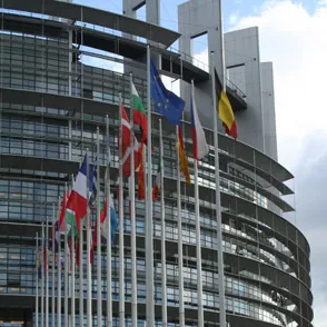 Festival di Spoleto flags wave outside modern European Parliament building