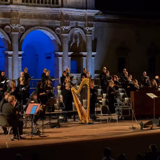Festival di Spoleto orchestra performing in stunning historic architectural setting