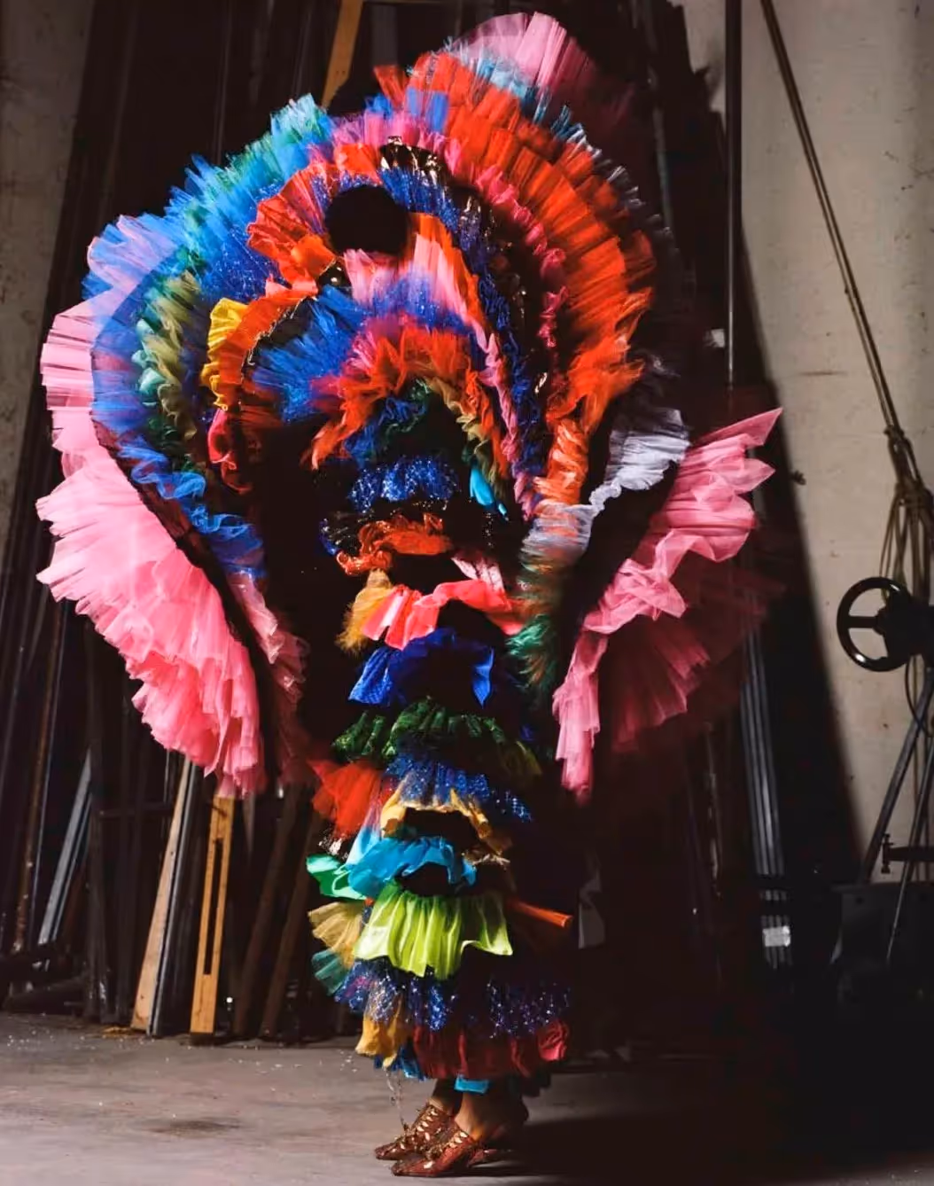 Vibrant colorful costume at Festival di Spoleto, ruffled layers of rainbow colors