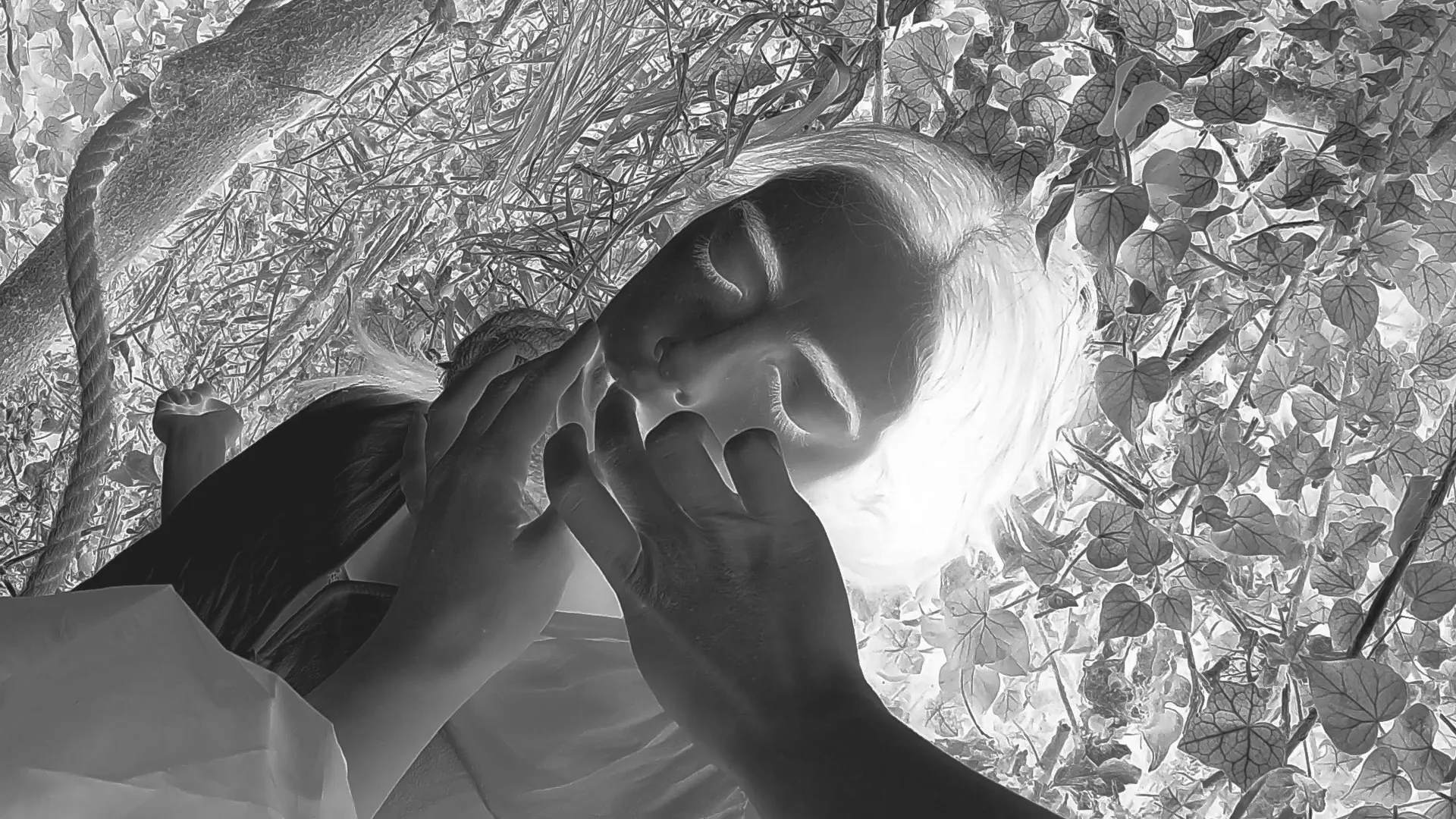 Festival di Spoleto performance art, expressive black and white portrait amid foliage