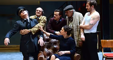 Festival di Spoleto performers in dramatic stage scene with diverse actors