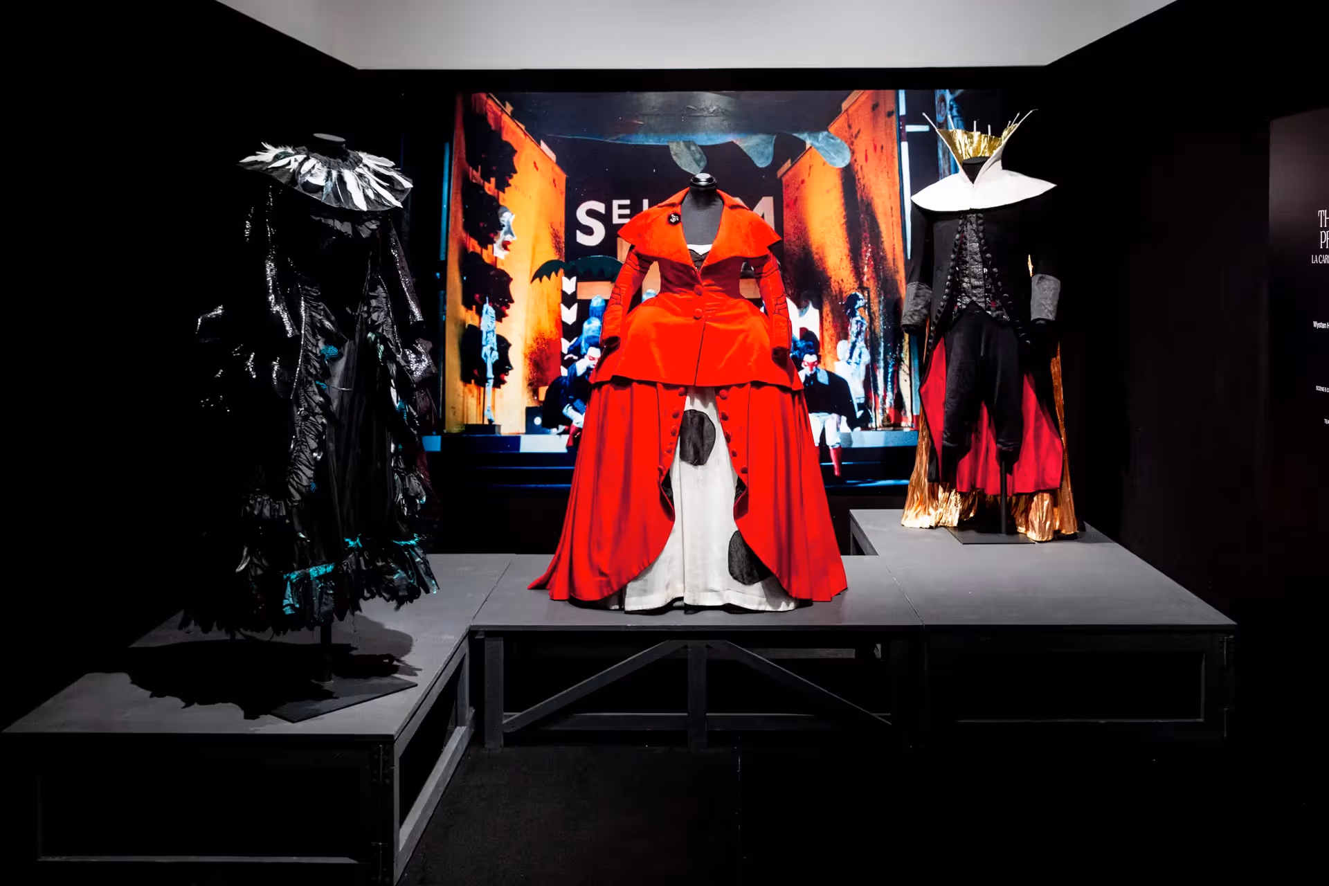 Festival di Spoleto exhibition featuring dramatic red and black costume designs