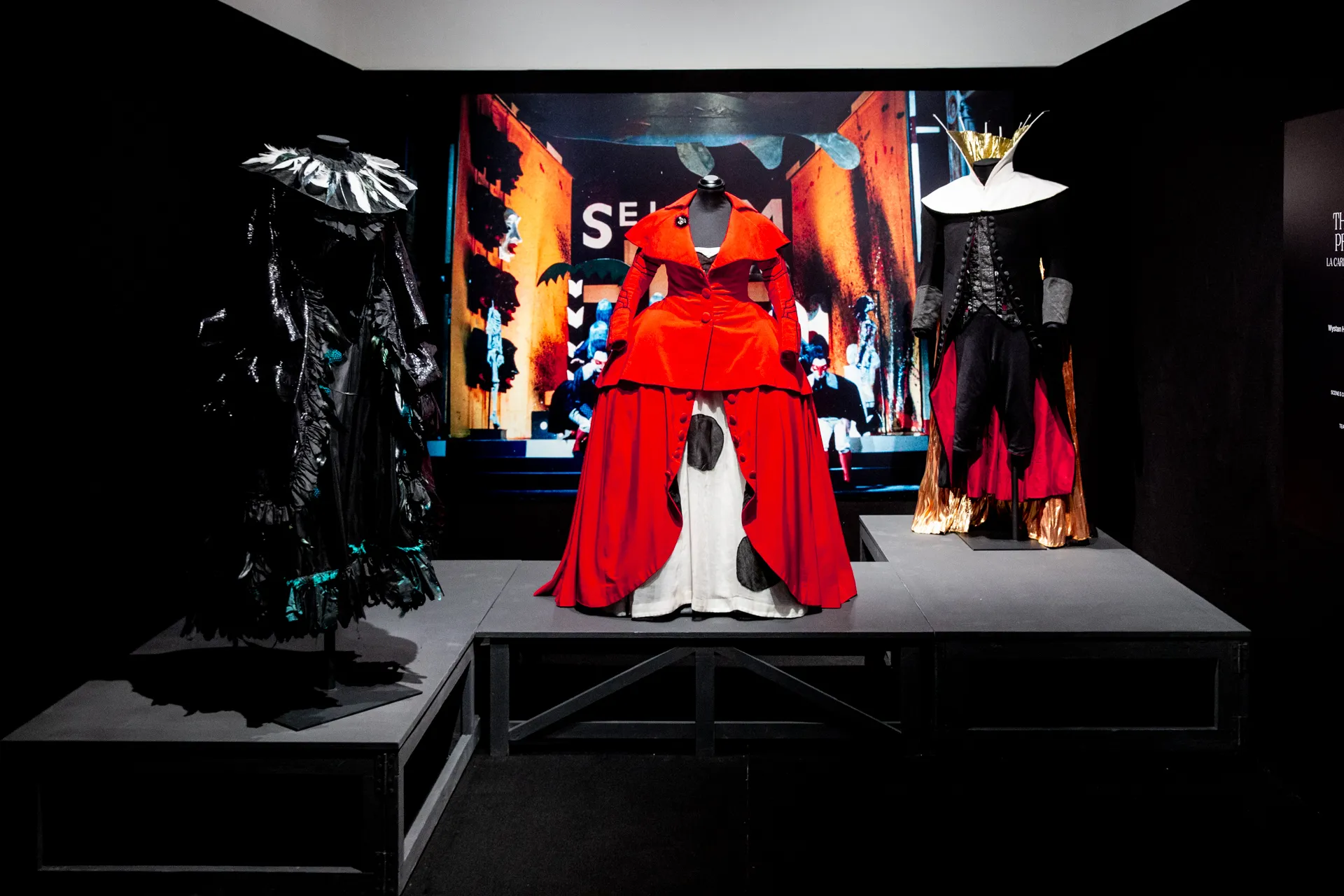 Festival di Spoleto exhibition featuring dramatic red and black costume designs