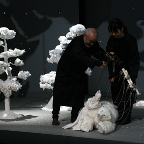 Avant-garde theatrical performance at Festival di Spoleto with stylized white sculptures