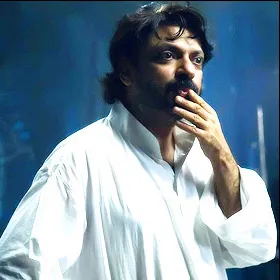 Performer in white shirt contemplating during Festival di Spoleto performance