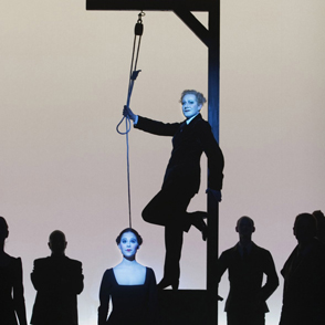 Festival di Spoleto performance explores dark theatrical scene with hanging silhouettes