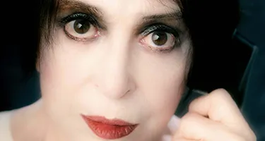 Festival di Spoleto poster featuring dramatic close-up of artist with intense gaze