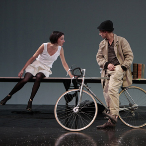 Festival di Spoleto performance with actors and bicycle on minimalist stage