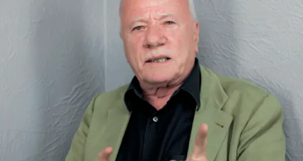 Artistic portrait of Festival di Spoleto distinguished participant in green jacket