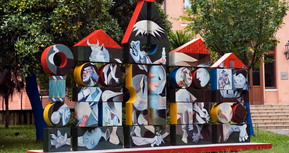 Festival di Spoleto art installation with cubist-style painted blocks and red houses