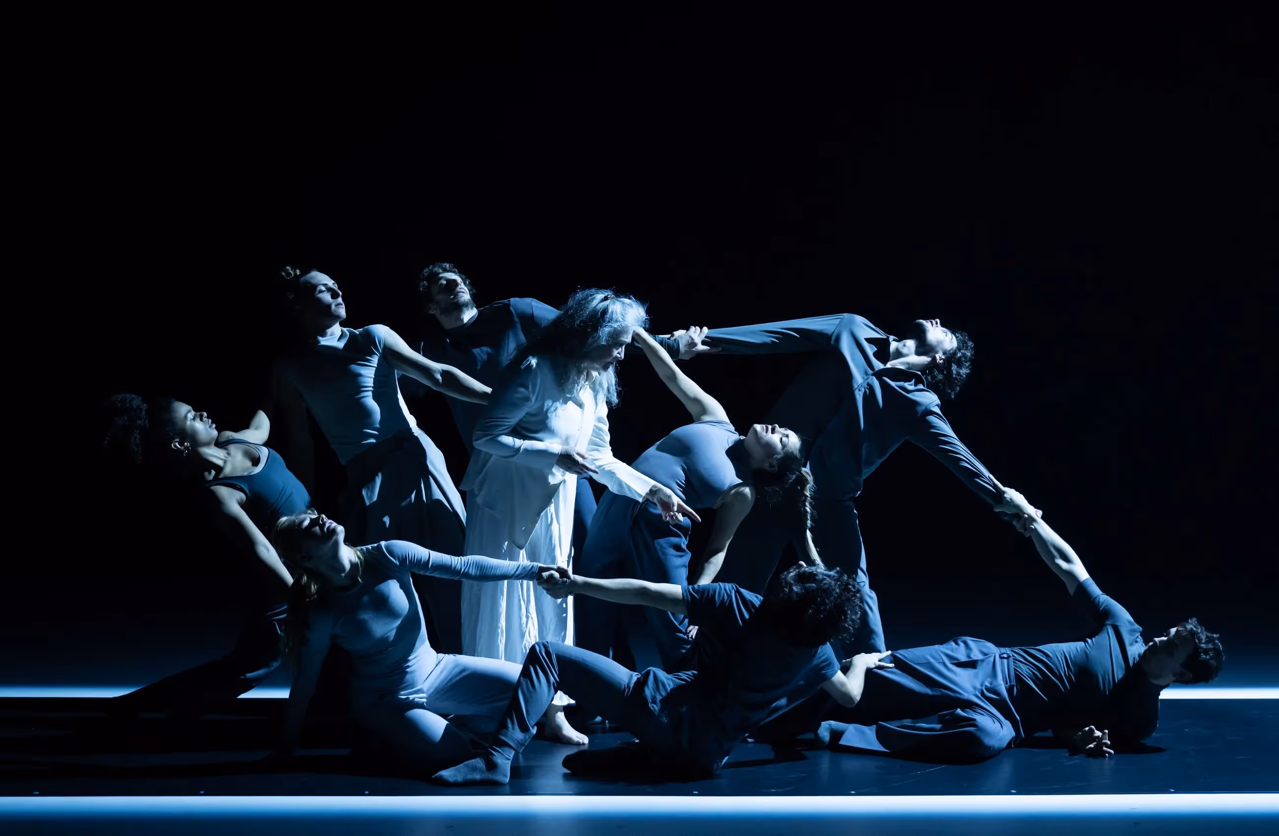 Dramatic dance performance at Festival di Spoleto with intertwined performers