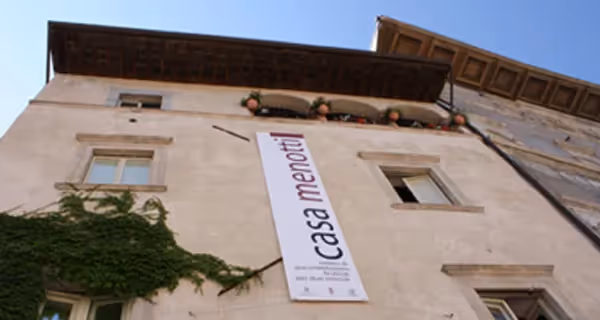 Casa Menotti at Festival di Spoleto, historic building with vertical banner