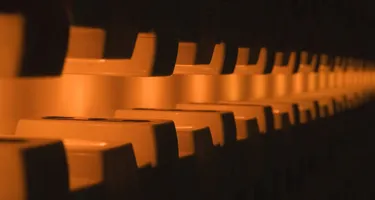 Festival di Spoleto orange seats in repetitive geometric pattern