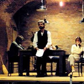 Festival di Spoleto performers on stage in rustic brick theater setting