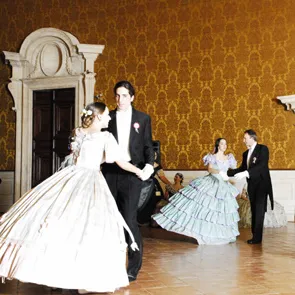 Elegant dancers at Festival di Spoleto, historic ballroom, vintage formal attire
