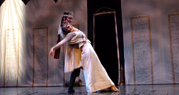 Dramatic dance performance at Festival di Spoleto with passionate embrace
