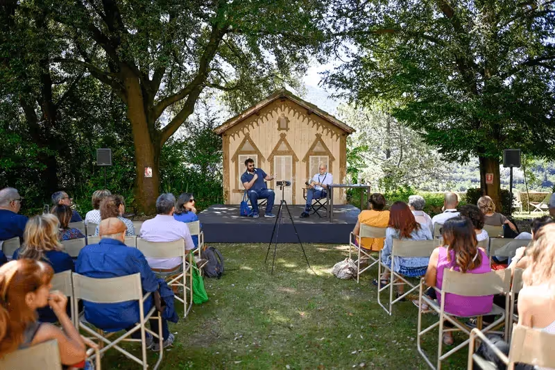 Video Festival di Spoleto outdoor performance with speakers on wooden stage