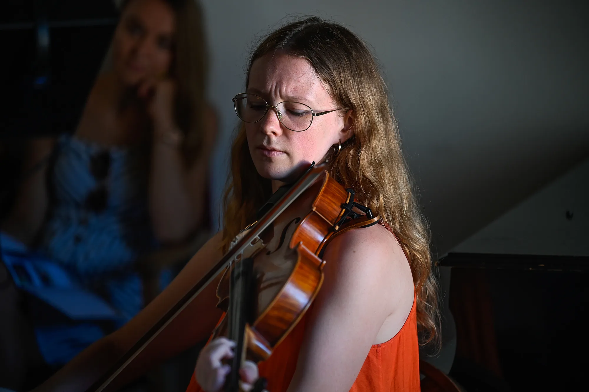 Violinist performing with closed eyes at Festival di Spoleto classical concert