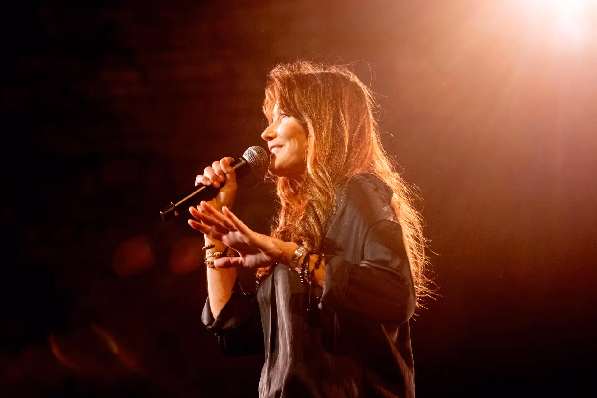 Performer singing passionately at Festival di Spoleto music concert