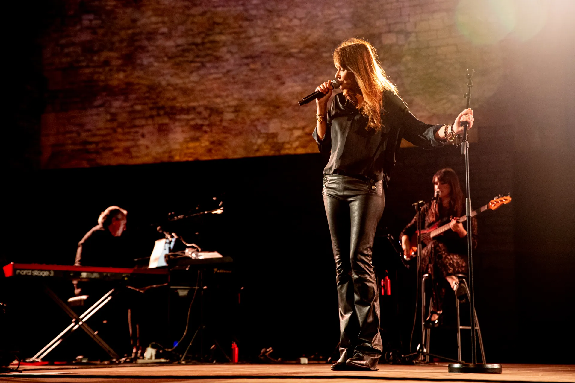 Musical performance at Festival di Spoleto with dramatic stage lighting