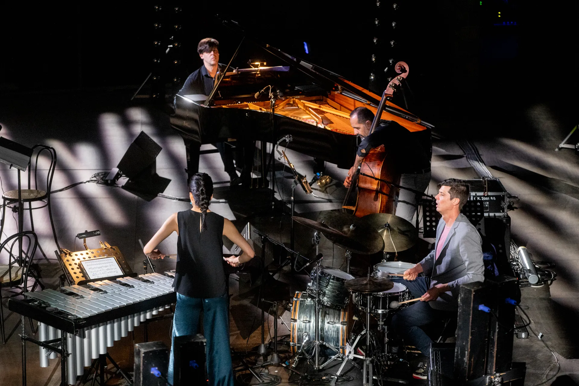 Jazz ensemble performing at Festival di Spoleto, showcasing multiple instruments