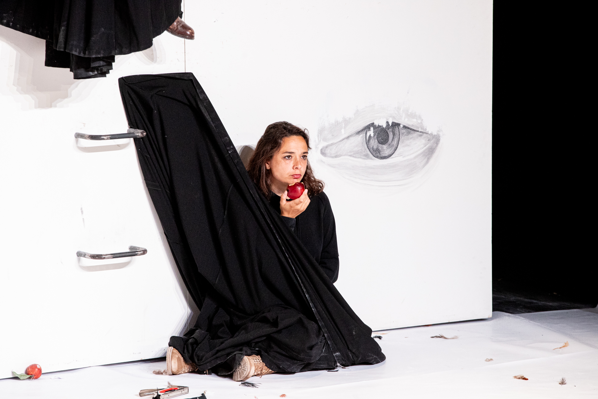 Festival di Spoleto performance art with woman, black dress, red apple