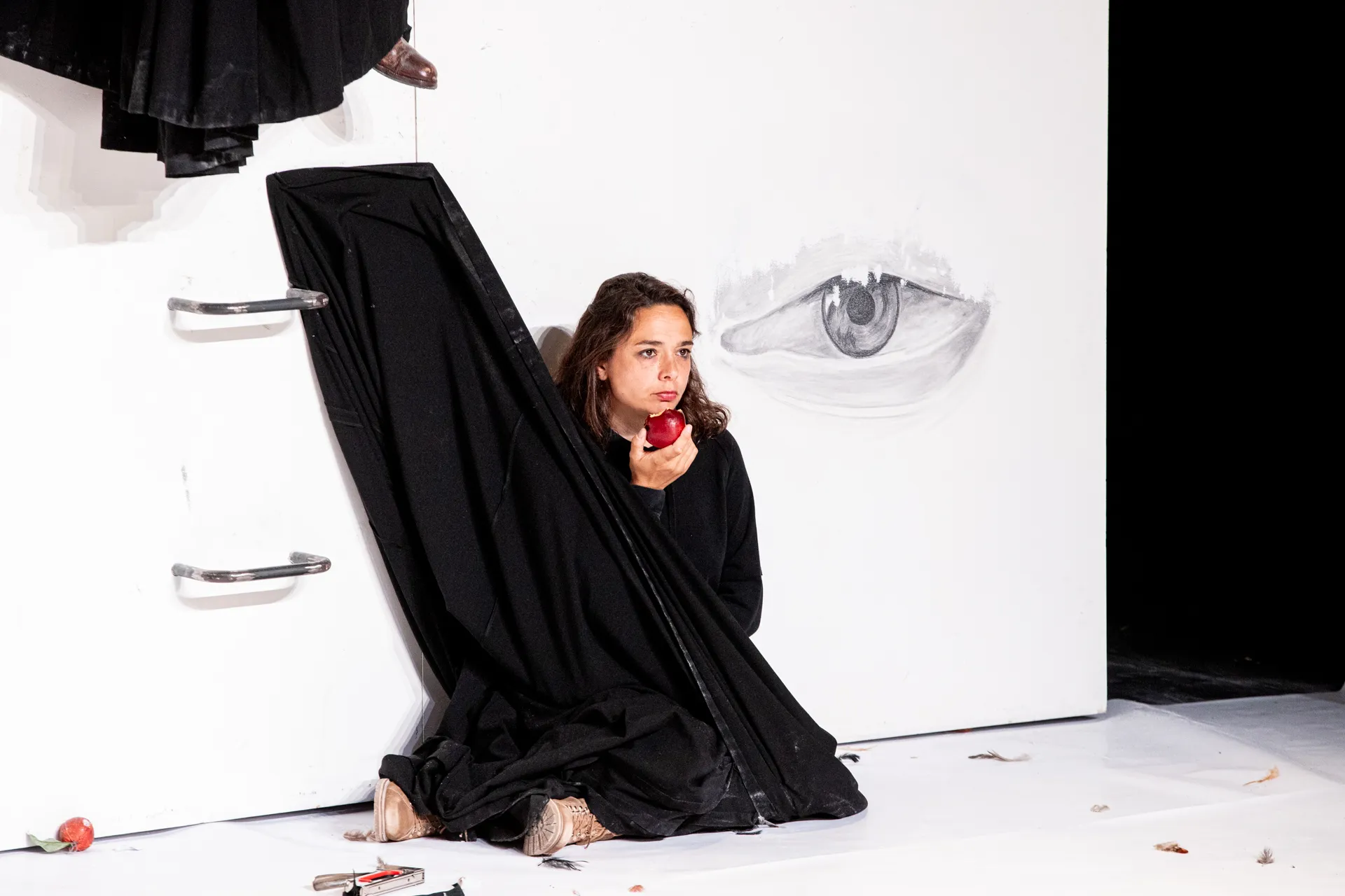 Festival di Spoleto performance art with woman, black dress, red apple