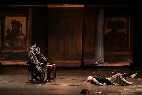 Festival di Spoleto dramatic theater performance with figures on sparse stage