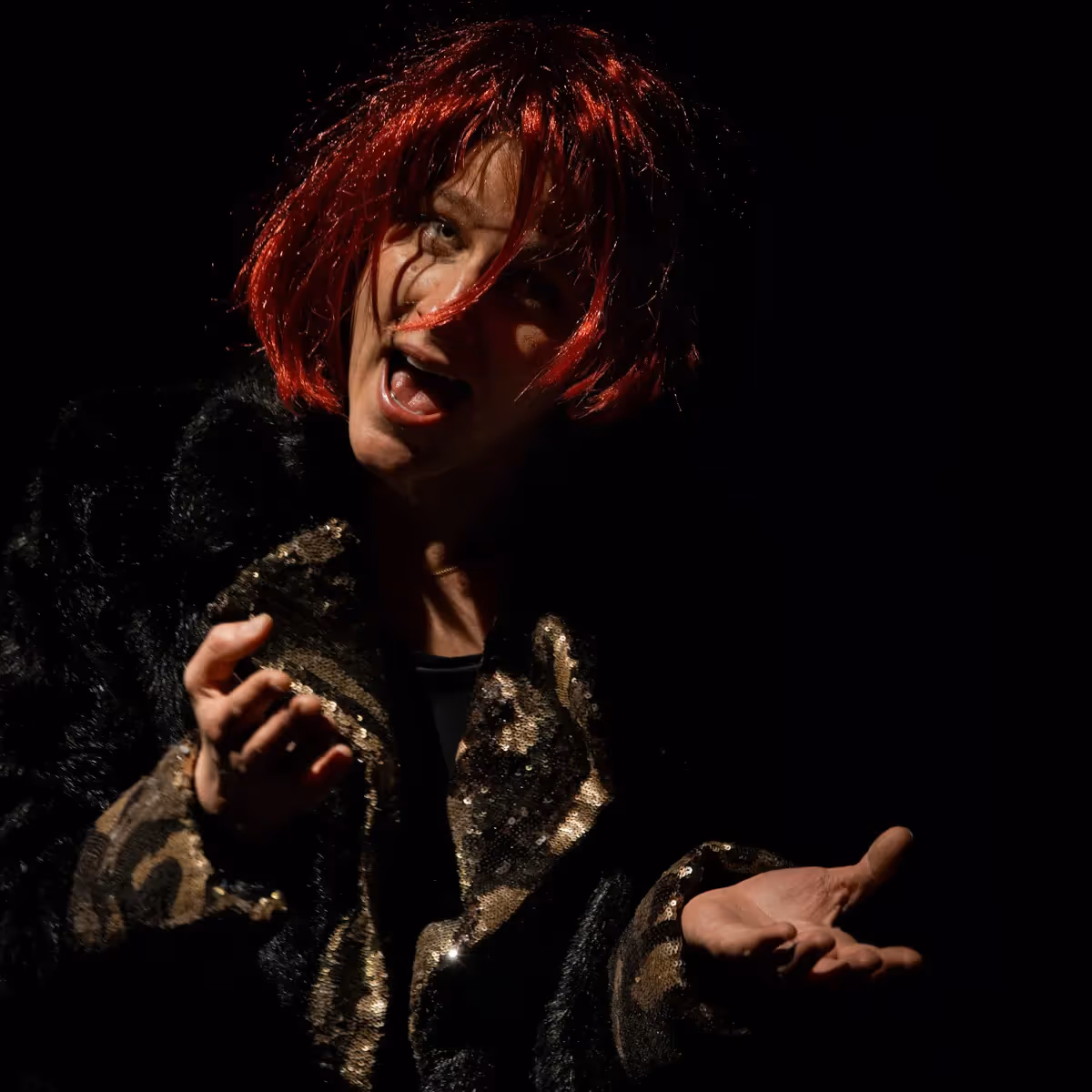 Passionate performer at Festival di Spoleto with fiery red hair