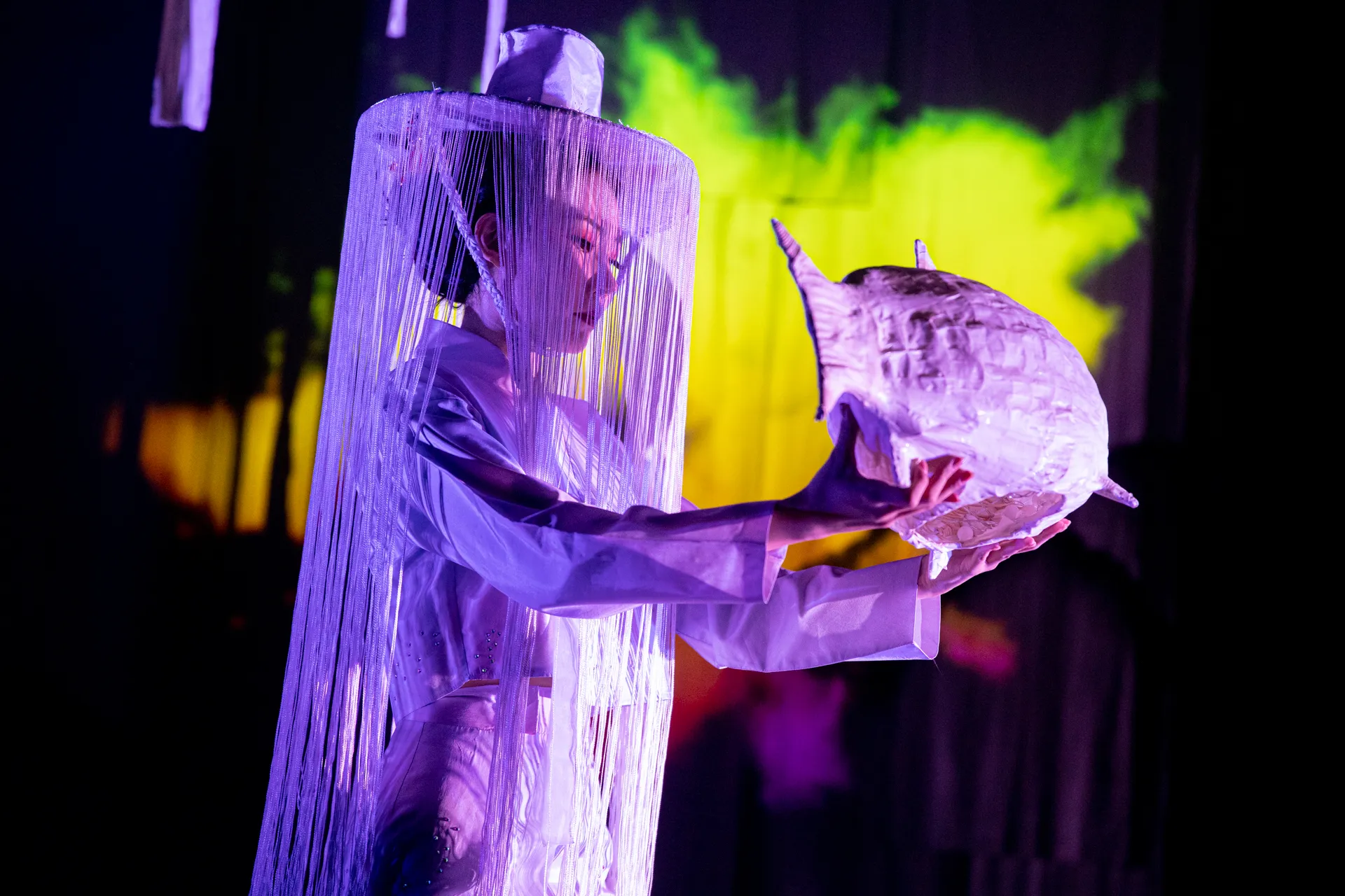 Experimental performance at Festival di Spoleto with vibrant purple stage design