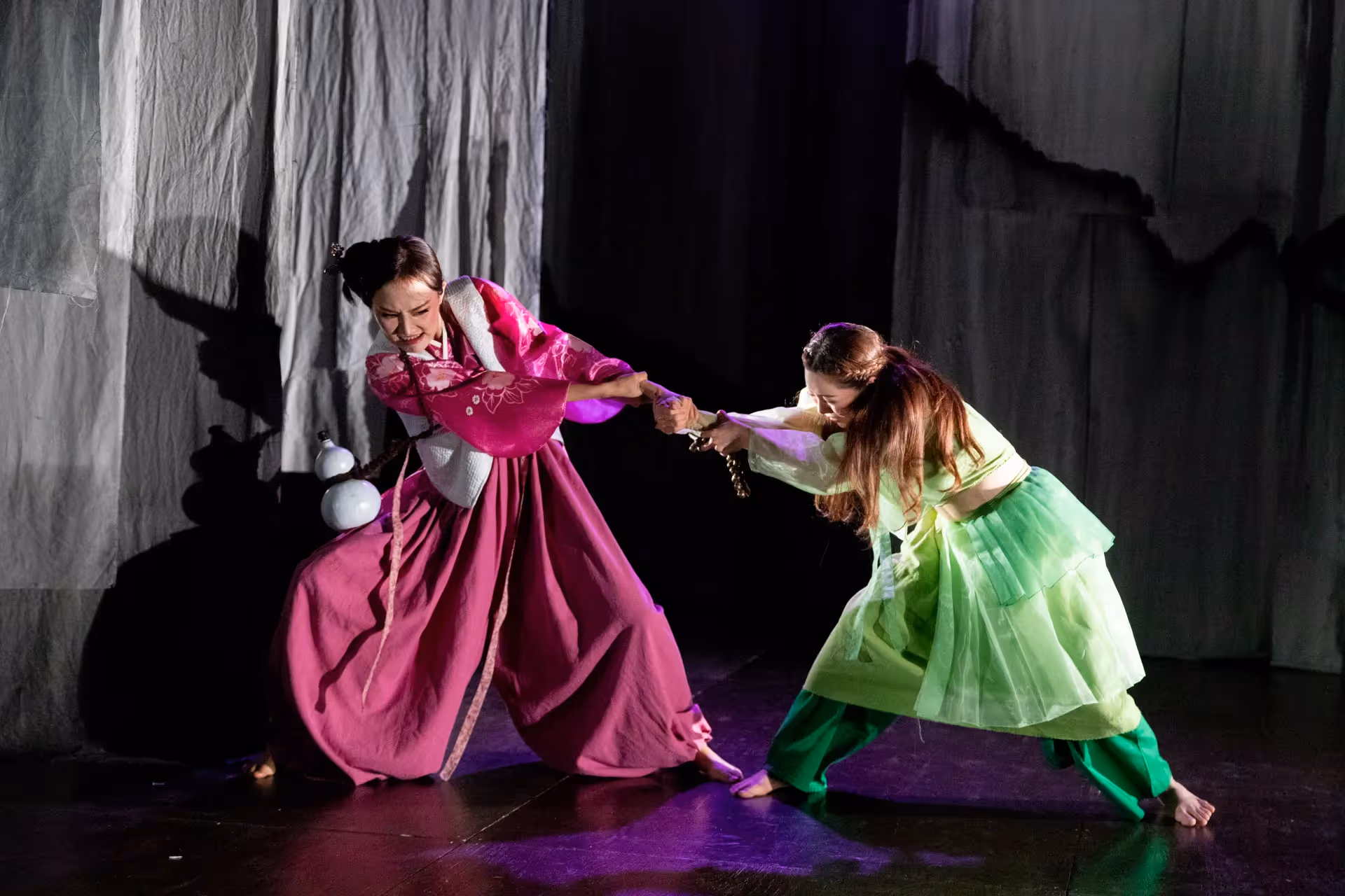 Festival di Spoleto performance with dancers in vibrant pink and green costumes