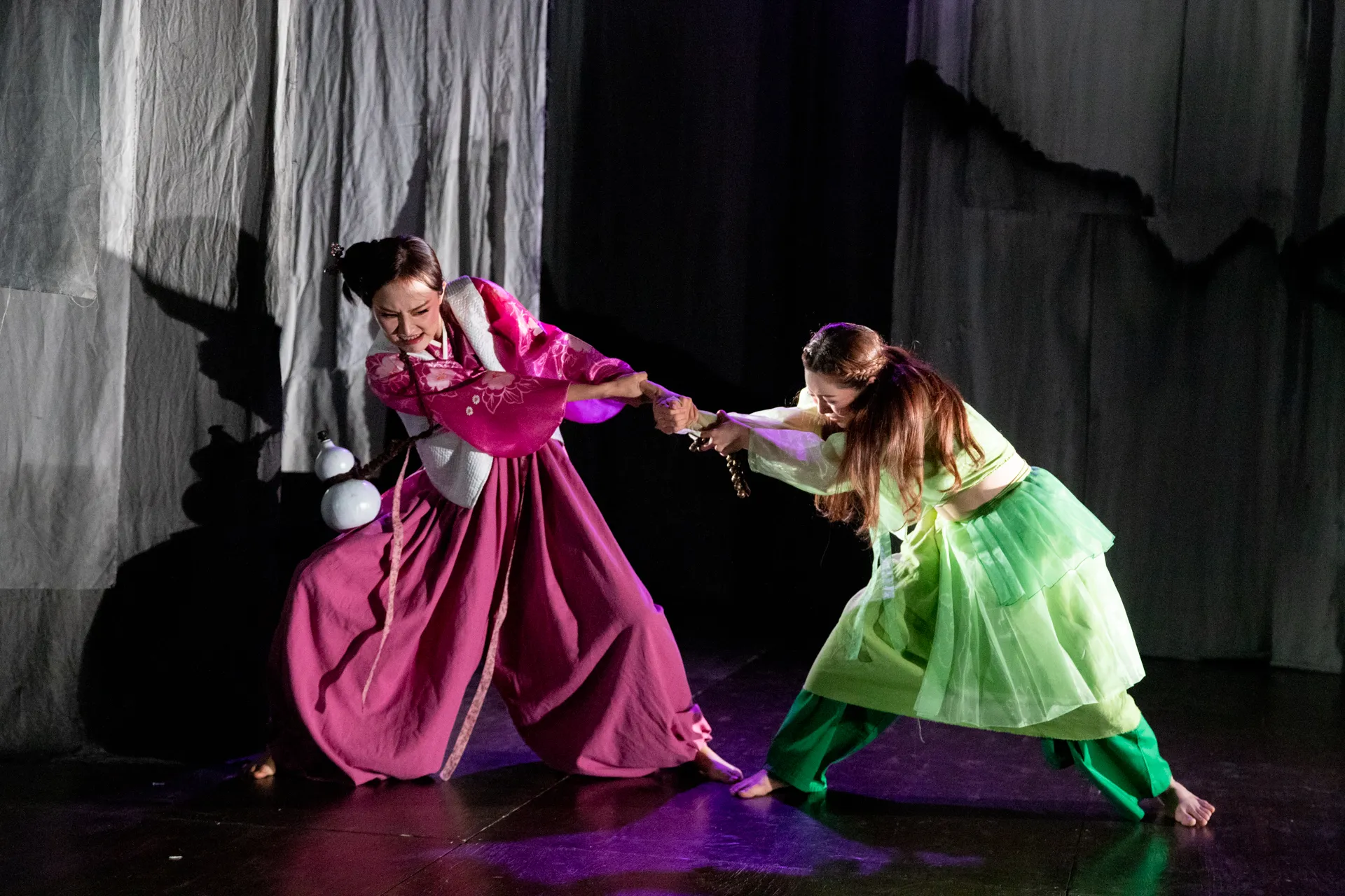 Festival di Spoleto performance with dancers in vibrant pink and green costumes