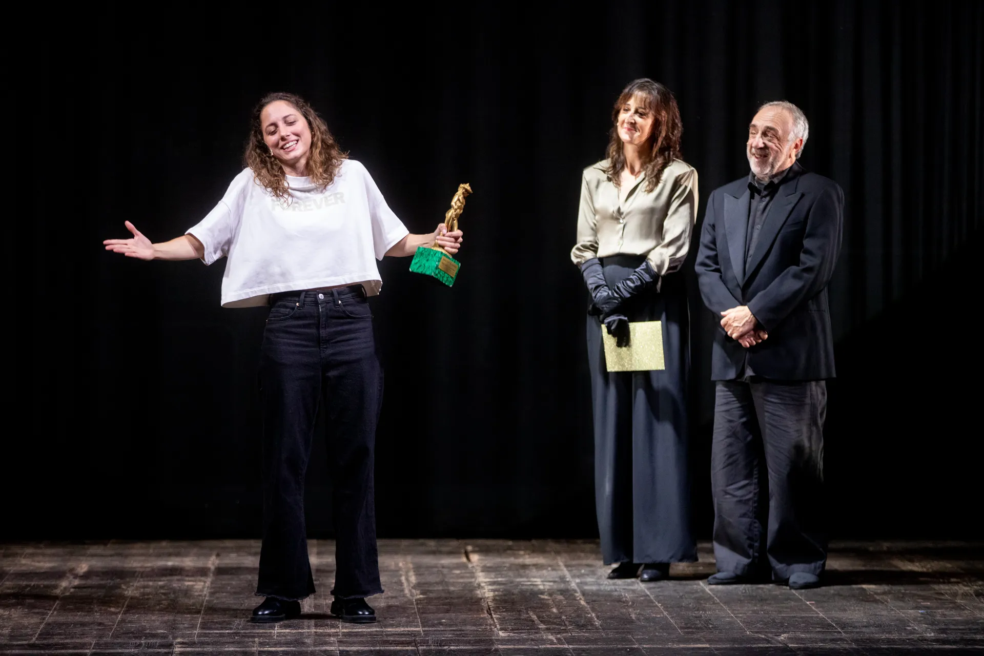 Festival di Spoleto award ceremony with joyful performers on stage