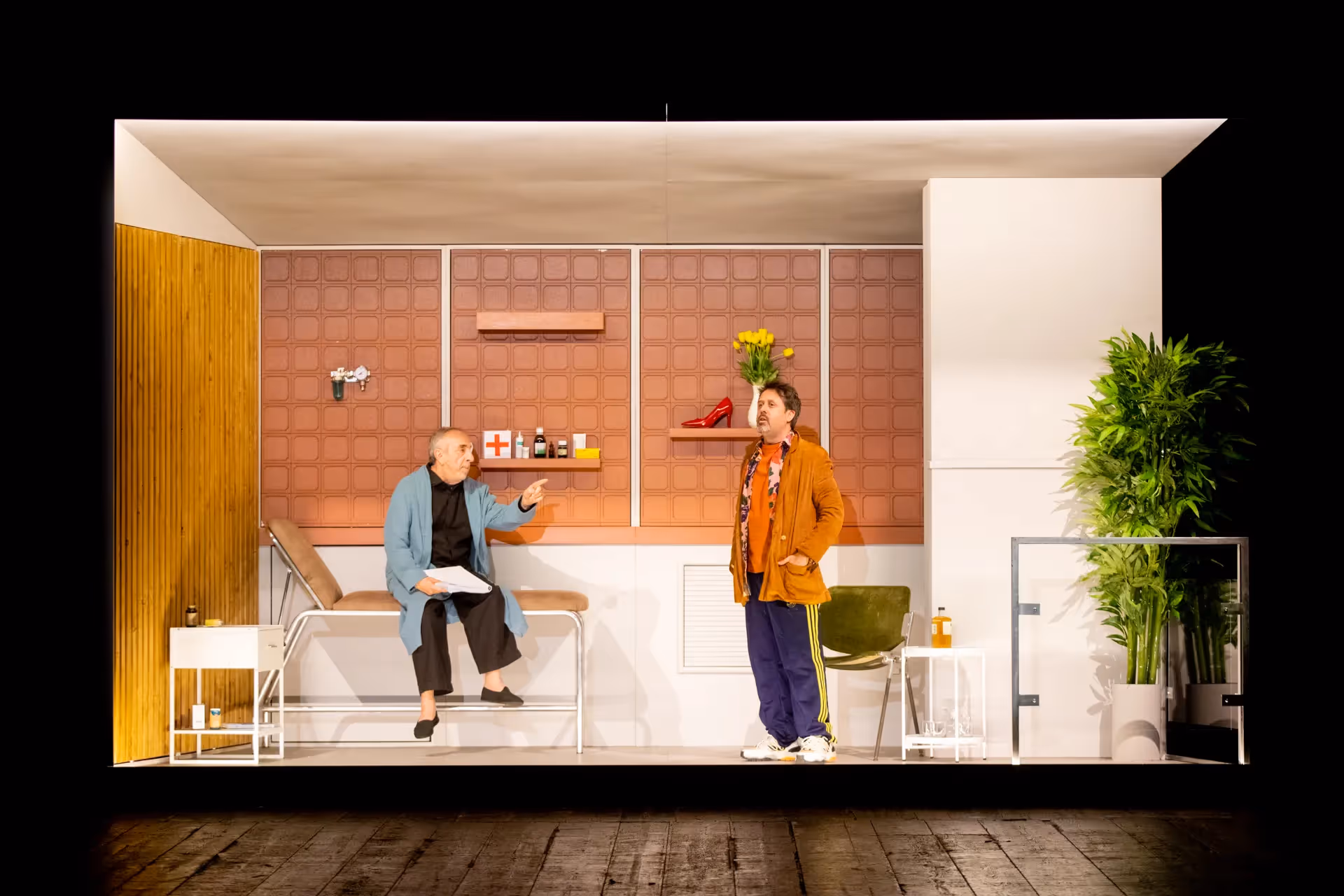 Festival di Spoleto theater stage with two performers in stylized medical setting