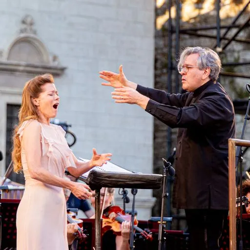 Passionate performers at Festival di Spoleto, conductor and soprano on outdoor stage